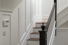 Custom Site Built Wainscoting finished in Benjamin Moore Regal Select Pearl Sprayed  Paint Finish
