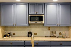 Blue painted kitchen cabinets