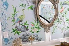 Birds and tree limbs with Mirror residential mural