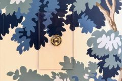 Switch Plate on Blue Tree Foliage Wallpaper