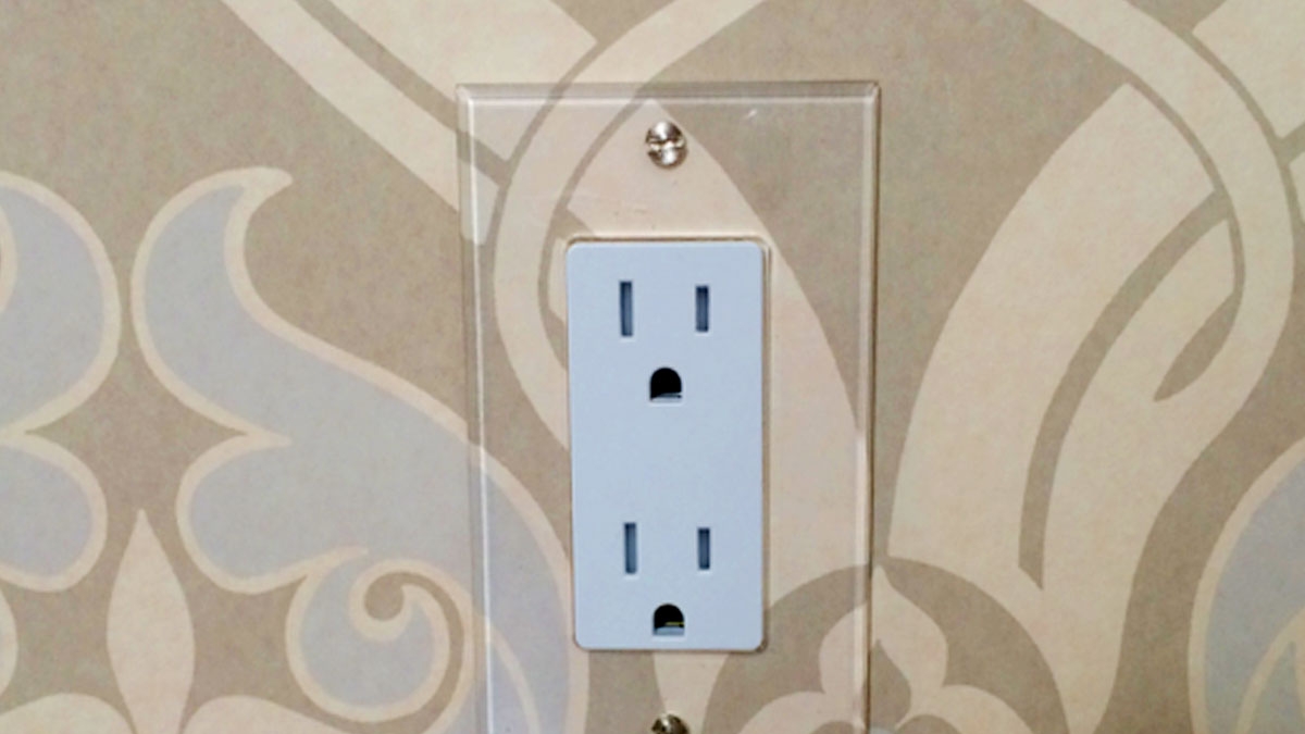 Switch plate treatment for wallpaper