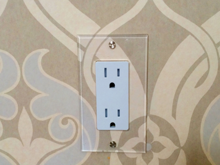 Switch plate treatment for wallpaper